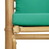 Sofa ogrodowa z zielonymi poduszkami, bambusowa